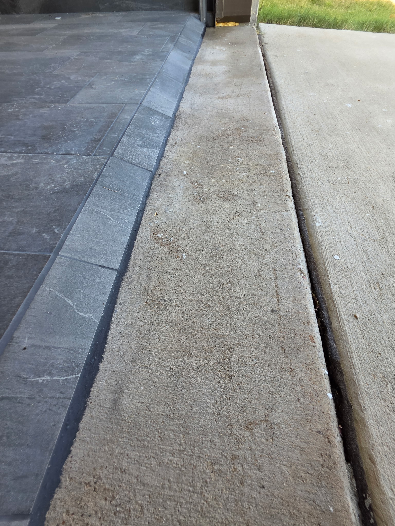 Concrete curb after cleaning