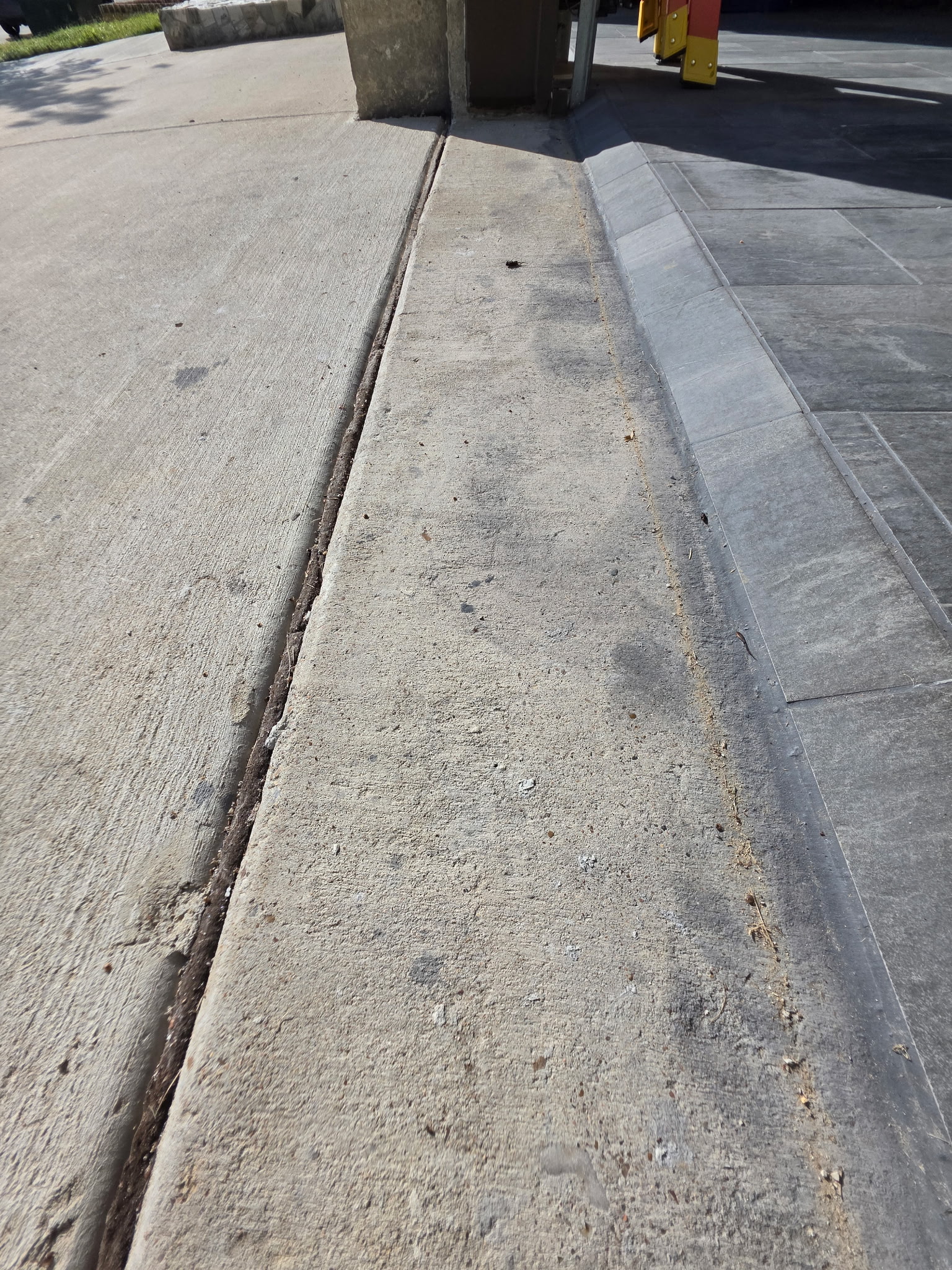 Concrete curb before cleaning
