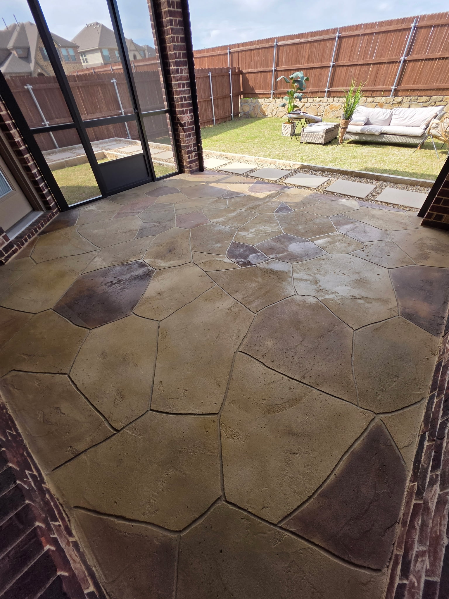 Stamped concrete patio before cleaning